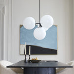 Load image into Gallery viewer, Ulvara Chandelie Linear Cluster Glass Globe Design - Contemporary Elegance
