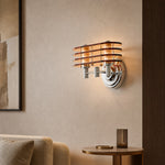 Afbeelding laden in galerijweergave, Bauhaus amber LED wall sconce casting warm light in a lounge