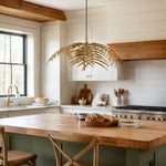 Cargar imagen en el visor de la Galería, Single layer gold palm leaf chandelier above a kitchen island