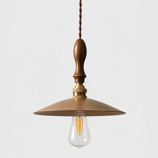 Hammered brass pendant with walnut wood on white background