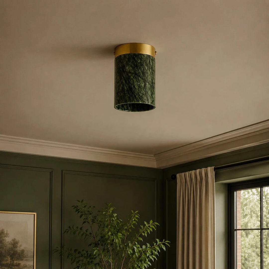 vintage green and gold ceiling light in a hallway scene