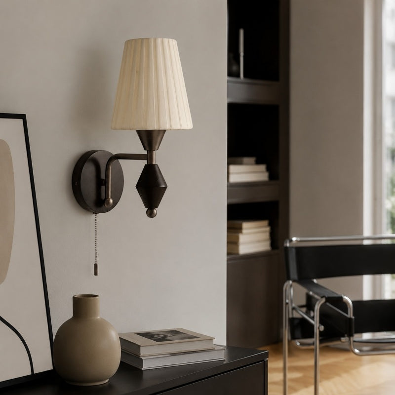 Console wall scene with matte nickel wall light