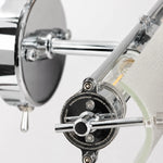 Cargar imagen en el visor de la Galería, Adjustable joint and chrome hardware detail on the wall light