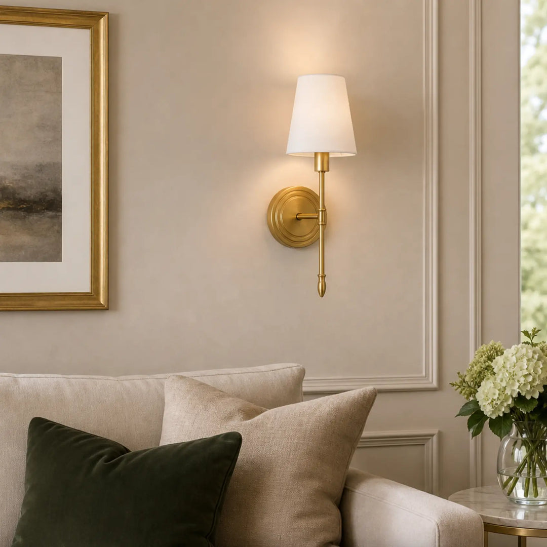 Decorative brass wall lamp in a refined living space