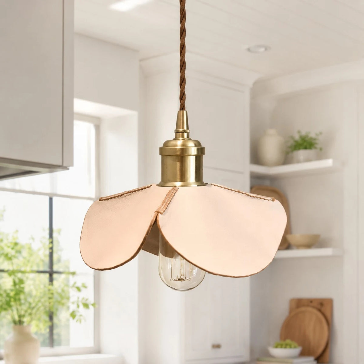 Leather petal pendant light in a bright kitchen corner