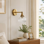 Cargar imagen en el visor de la Galería, Vintage brass wall light above a styled bedside table