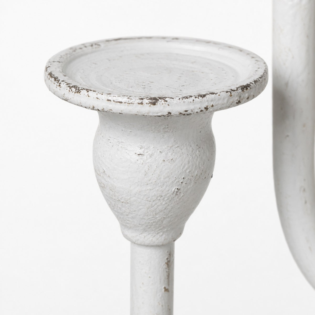 Close view of ivory branch candle cup and distressed finish