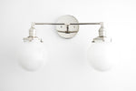 Load image into Gallery viewer, Lumio Globe Glass Globe Vanity Light - Modern Two Light Bathroom Sconce
