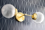 Load image into Gallery viewer, Lumio Globe Versatile Vanity Sconce - Dimmable Light for Bathroom and Hallway Use
