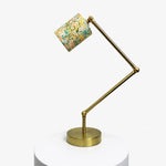 Cargar imagen en el visor de la Galería, Adjustable brass-tone table lamp with cream garden floral fabric shade