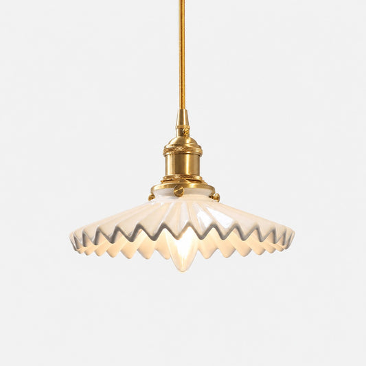 White pleated ceramic pendant light with brass-finish base