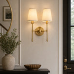 Carica l'immagine nella visualizzazione Galleria, Brass wall light in an elegant interior setting