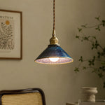 Cargar imagen en el visor de la Galería, Blue ceramic pendant light beside a woven chair and wall art