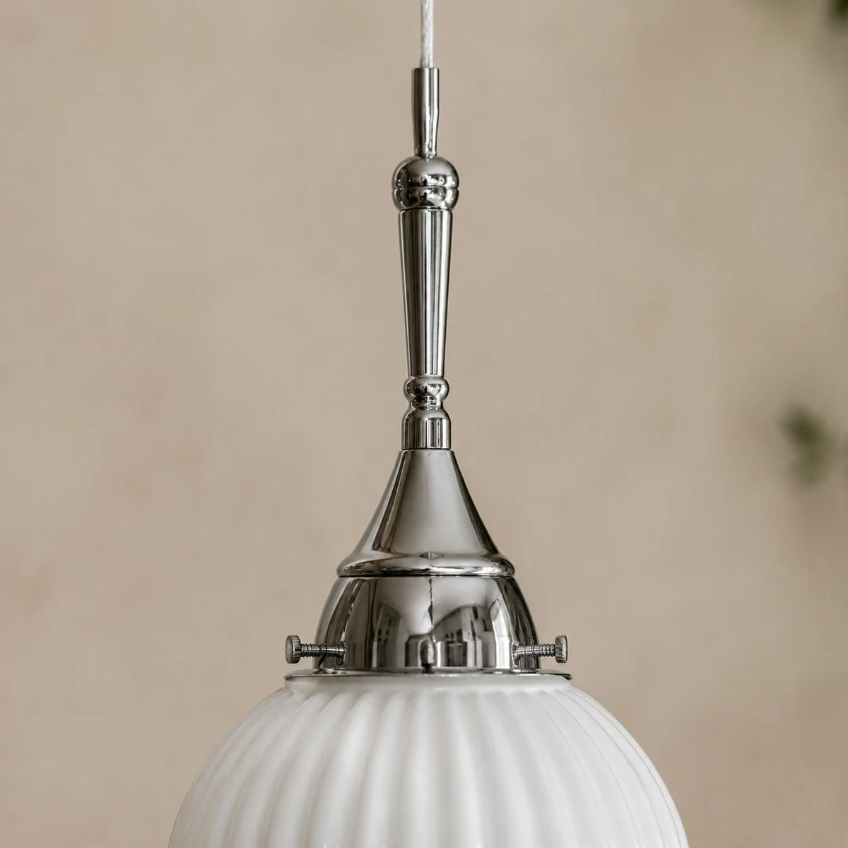 Close view of polished metal cap and stem