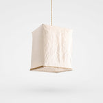 Load image into Gallery viewer, Sculptural linen pendant light on a clean light background