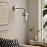 Bild in die Galerieansicht laden, Aluminum glass wall sconce in a calm interior corner