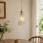 Charger l'image dans la visionneuse de la galerie, Style G vertically ribbed glass pendant beside a softly lit window