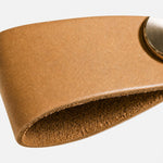 Afbeelding laden in galerijweergave, Cowhide leather and brass cabinet pull handle detail and lifestyle image