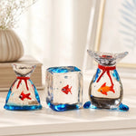 Load image into Gallery viewer, Three handmade glass goldfish ornaments displayed together