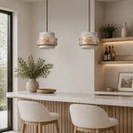Załaduj obraz do przeglądarki galerii, Travertine pendant lamps above a calm dining bar