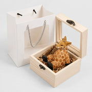 Hand-carved wooden animal phone stand