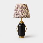 Charger l'image dans la visionneuse de la galerie, Matte black vintage table lamp with purple floral pleated shade on white background