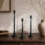 Carica l'immagine nella visualizzazione Galleria, Black iron candle holder set styled on a warm wabi-sabi console table