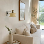 Cargar imagen en el visor de la Galería, Cream glass wall lamp above a sofa