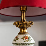 Afbeelding laden in galerijweergave, Antique metal detail below the red lampshade