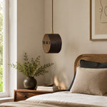 Cargar imagen en el visor de la Galería, Hand-laced leather cylinder pendant light in an interior setting