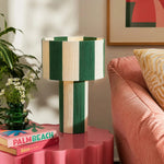 Load image into Gallery viewer, Green striped woven table lamp styled on a pink side table