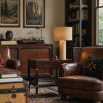 Load image into Gallery viewer, Woven jute table lamp in a warm reading room