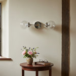Load image into Gallery viewer, Lumio Globe Versatile Vanity Sconce - Dimmable Light for Bathroom and Hallway Use
