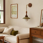 Cargar imagen en el visor de la Galería, Wabi sabi wall sconce installed beside a sofa and wooden cabinet in a calm living room