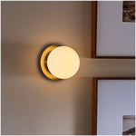 Load image into Gallery viewer, Rivolence Wall Sconce – Antique Brass Milk Glass Light
