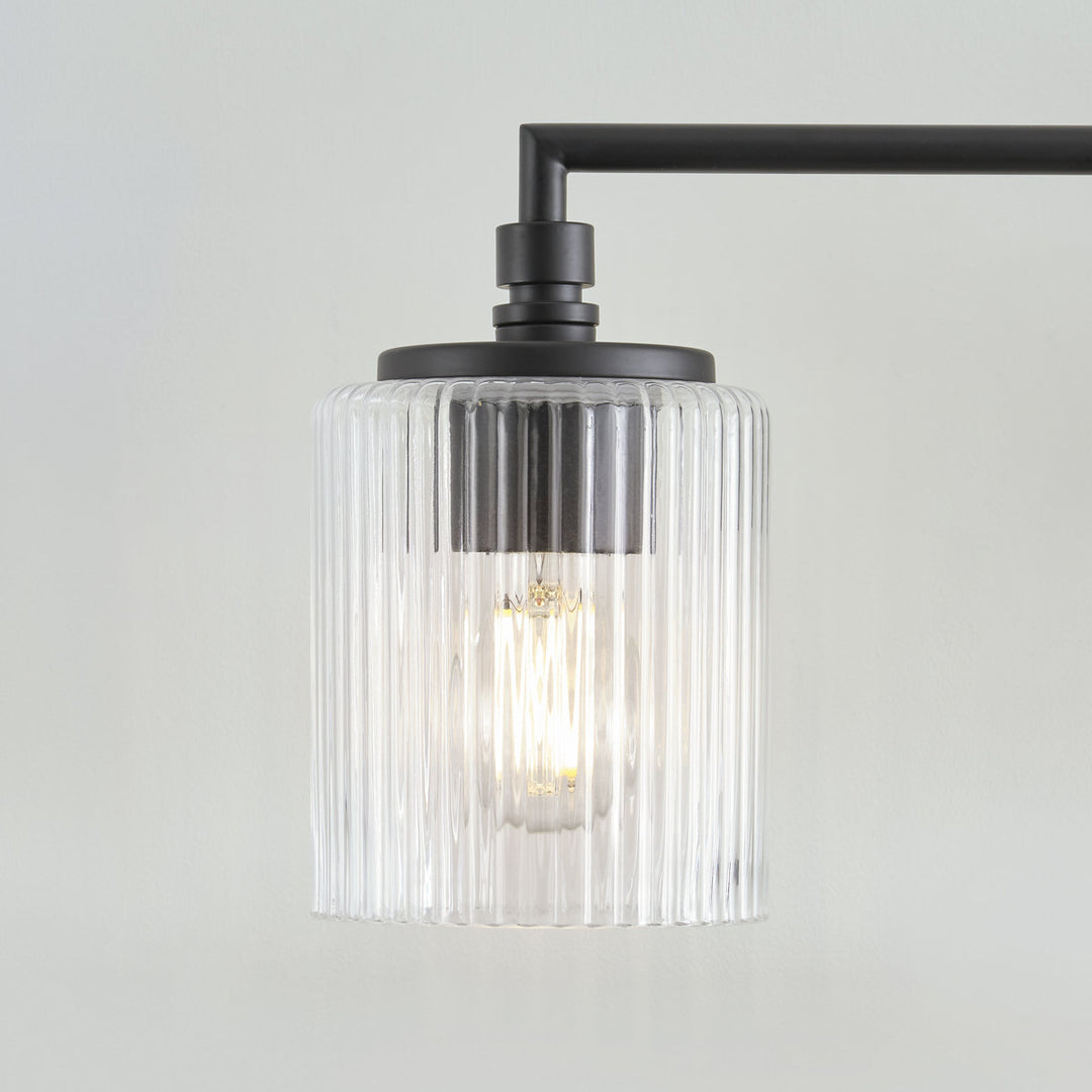 Luz de tocador Lirra de 3 luces regulable de vidrio y metal - Diseño moderno para baño y dormitorio