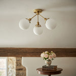 Load image into Gallery viewer, Glorica Glass Chandelier - Brass Globe Ceiling Light with Opal Shade
