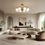 Load image into Gallery viewer, Glass globe chandelier in a warm living room