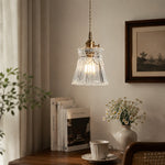 Charger l'image dans la visionneuse de la galerie, Style M ornate clear glass pendant beside books and tableware