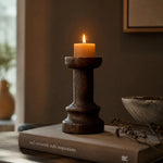 Afbeelding laden in galerijweergave, Solid wood candle holder styled on books in a warm interior; candle not included