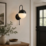 Carica l'immagine nella visualizzazione Galleria, Black milk glass wall lamp in a hallway