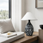 Afbeelding laden in galerijweergave, Ceramic table lamp beside a bright seating area