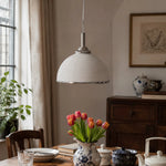 Cargar imagen en el visor de la Galería, White ribbed pendant light over a dining table with tulips