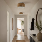 Afbeelding laden in galerijweergave, Amber glass flush-mount ceiling light in a bright hallway