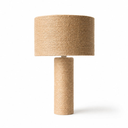 Woven jute cylinder table lamp on a white background
