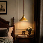 Cargar imagen en el visor de la Galería, Yellow ceramic pendant light used as a bedside accent fixture