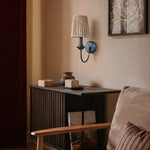 Carica l'immagine nella visualizzazione Galleria, Fabric wall sconce installed above a dark console