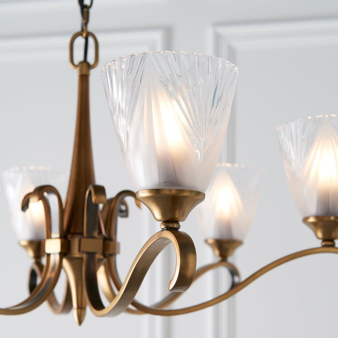 Lustre Multi-Lumière Lunetal avec Accents en Cristal Finition Laiton - Luxe Moderne pour Salle à Manger et Salon