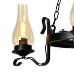 Afbeelding laden in galerijweergave, Close-up of clear hurricane glass shade and curved black iron arm
