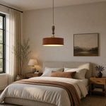 Load image into Gallery viewer, Vintage brown leather pendant installed in a warm neutral bedroom